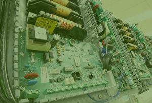 A PCB board compelte with electrical wirings and devices - representing the Electro-Mechanical service of VR Industries.